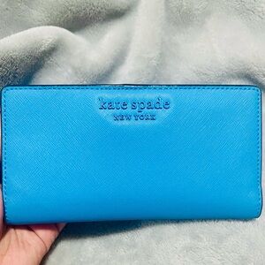Kate Spade Madison Large Slim
Saffiano Leather Wallet, color blue.